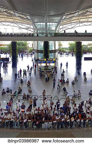 "Concourse, arrival with waiting greeters, Ngurah Rai Airport or Denpasar International Airport, Tuban, Bali, Indonesia, Asia" View Large Photo Image Stock Photo - "Concourse, arrival with waiting greeters, Ngurah Rai Airport or Denpasar International Airport, Tuban, Bali, Indonesia, Asia". Fotosearch