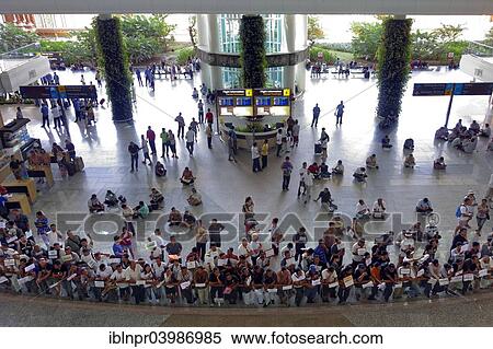 "Concourse, arrival with waiting greeters, Ngurah Rai Airport or Denpasar International Airport, Tuban, Bali, Indonesia, Asia" View Large Photo Image Stock Photography - "Concourse, arrival with waiting greeters, Ngurah Rai Airport or Denpasar International Airport, Tuban, Bali, Indonesia, Asia". Fotosearch