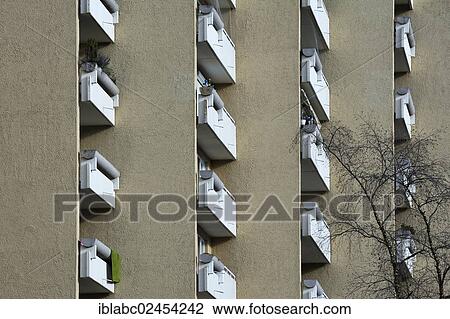 "Concrete balconies of a high-rise residential apartment building from the seventies in the satellite city of Neuperlach, Munich, Bavaria, Germany, Europe" View Large Photo Image Stock Image - "Concrete balconies of a high-rise residential apartment building from the seventies in the satellite city of Neuperlach, Munich, Bavaria, Germany, Europe". Fotosearch