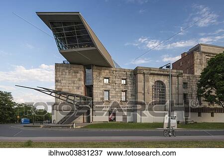 Stock Photo - "Congress Hall of the Nazi Party, 1933-1945, not completed, Documentation Centre Nazi Party Rally Grounds, modern extension built in 2001, walk-in """"arrow"""" of glass and steel, architect Gunther Domenig, Nuremberg, Bavaria, Germany, Europe". Fotosearch