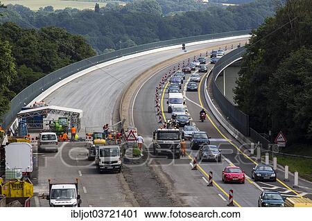 "Construction and slow-moving traffic on a motorway construction site on the A52 motorway, Ratingen, North Rhine-Westphalia, Germany, Europe" View Large Photo Image Stock Image - "Construction and slow-moving traffic on a motorway construction site on the A52 motorway, Ratingen, North Rhine-Westphalia, Germany, Europe". Fotosearch