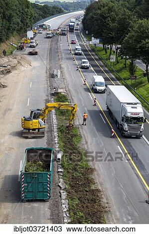 "Construction and slow-moving traffic on a motorway construction site on the A52 motorway, Ratingen, North Rhine-Westphalia, Germany, Europe" View Large Photo Image Stock Image - "Construction and slow-moving traffic on a motorway construction site on the A52 motorway, Ratingen, North Rhine-Westphalia, Germany, Europe". Fotosearch