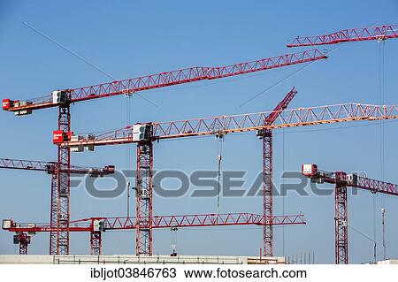 "Construction cranes at a construction site, new building of the university Ruhr-West, Mulheim an der Ruhr, North Rhine-Westphalia, Germany, Europe" View Large Photo Image Stock Image - "Construction cranes at a construction site, new building of the university Ruhr-West, Mulheim an der Ruhr, North Rhine-Westphalia, Germany, Europe". Fotosearch