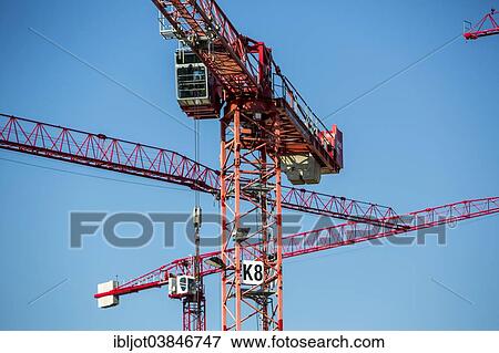 "Construction cranes at a construction site, construction site of the Hochschule Ruhr-West University of Applied Sciences, Mulheim, North Rhine-Westphalia, Germany, Europe" View Large Photo Image Stock Photo - "Construction cranes at a construction site, construction site of the Hochschule Ruhr-West University of Applied Sciences, Mulheim, North Rhine-Westphalia, Germany, Europe". Fotosearch
