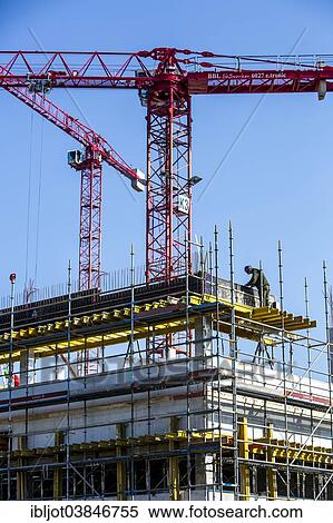 "Construction cranes at a construction site, construction site of the Hochschule Ruhr-West University of Applied Sciences, Mulheim, North Rhine-Westphalia, Germany, Europe" View Large Photo Image Stock Photography - "Construction cranes at a construction site, construction site of the Hochschule Ruhr-West University of Applied Sciences, Mulheim, North Rhine-Westphalia, Germany, Europe". Fotosearch