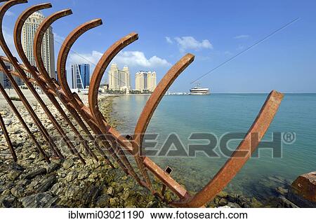 "Construction hoarding in front of the Four Seasons Hotel, Falcon and Pearl Towers, Doha Hilton Hotel, Doha, Doha, Qatar, Asia" View Large Photo Image Stock Image - "Construction hoarding in front of the Four Seasons Hotel, Falcon and Pearl Towers, Doha Hilton Hotel, Doha, Doha, Qatar, Asia". Fotosearch