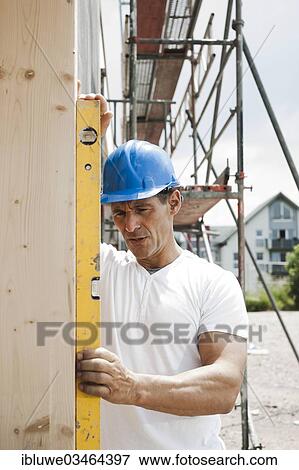 Construction Manager Controlling The Window Installation With A Spirit Level Mannheim Baden Wurttemberg Germany Europe Stock Photo Ibluwe Fotosearch