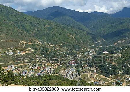 Stock Photo - "Construction of a new residential neighborhood on the outskirts of Thimphu as a result of rapid urbanization, Thimphu, Bhutan, Asia". Fotosearch