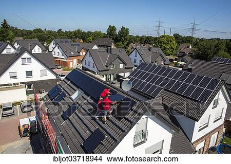 "Construction of a solar energy system on a house, installation of solar panels on a pitched roof, Bottrop, Ruhr district, North Rhine-Westphalia, Germany, Europe" View Large Photo Image Picture - "Construction of a solar energy system on a house, installation of solar panels on a pitched roof, Bottrop, Ruhr district, North Rhine-Westphalia, Germany, Europe". Fotosearch