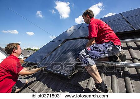 "Construction of a solar energy system on a house, installation of solar panels on a pitched roof, Bottrop, Ruhr district, North Rhine-Westphalia, Germany, Europe" View Large Photo Image Stock Image - "Construction of a solar energy system on a house, installation of solar panels on a pitched roof, Bottrop, Ruhr district, North Rhine-Westphalia, Germany, Europe". Fotosearch