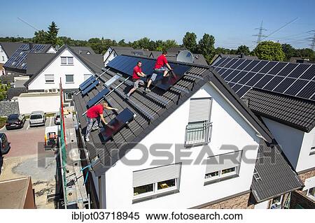 "Construction of a solar energy system on a house, installation of solar panels on a pitched roof, Bottrop, Ruhr district, North Rhine-Westphalia, Germany, Europe" View Large Photo Image Stock Photography - "Construction of a solar energy system on a house, installation of solar panels on a pitched roof, Bottrop, Ruhr district, North Rhine-Westphalia, Germany, Europe". Fotosearch