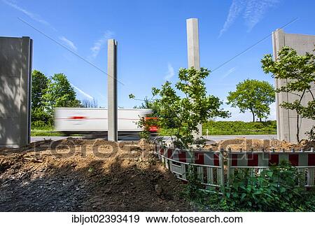 "Construction of noise barriers on the A52 motorway, in the Essen districts of Bredeney and Haarzopf, Essen, North Rhine-Westphalia, Germany, Europe" View Large Photo Image Stock Photo - "Construction of noise barriers on the A52 motorway, in the Essen districts of Bredeney and Haarzopf, Essen, North Rhine-Westphalia, Germany, Europe". Fotosearch