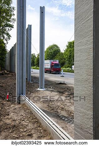 "Construction of noise barriers on the A52 motorway, in the Essen districts of Bredeney and Haarzopf, Essen, North Rhine-Westphalia, Germany, Europe" View Large Photo Image Stock Photography - "Construction of noise barriers on the A52 motorway, in the Essen districts of Bredeney and Haarzopf, Essen, North Rhine-Westphalia, Germany, Europe". Fotosearch