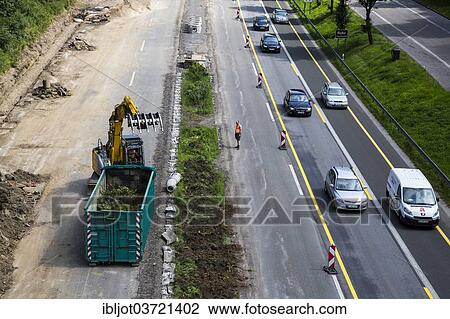 "Construction on a motorway construction site on the A52 motorway, Ratingen, North Rhine-Westphalia, Germany, Europe" View Large Photo Image Stock Image - "Construction on a motorway construction site on the A52 motorway, Ratingen, North Rhine-Westphalia, Germany, Europe". Fotosearch