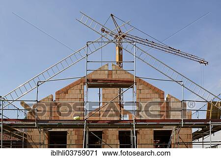 "Construction site, bare brickwork of a single family house, Egling, Upper Bavaria, Bavaria, Germany, Europe" View Large Photo Image Stock Image - "Construction site, bare brickwork of a single family house, Egling, Upper Bavaria, Bavaria, Germany, Europe". Fotosearch