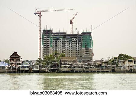 Stock Photo - "Construction site, Chao Phraya River, Bangkok, Thailand, Asia". Fotosearch