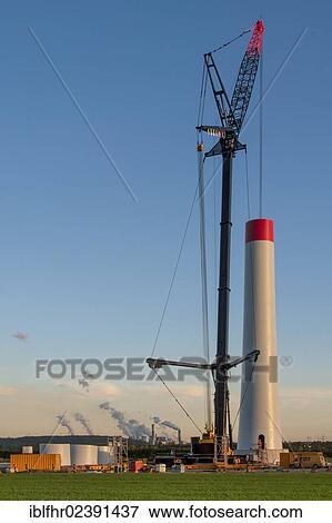 "Construction site of a new wind farm, coal-fired power plant at back, Grevenbroich, North Rhine-Westphalia, Germany, Europe" View Large Photo Image Stock Photo - "Construction site of a new wind farm, coal-fired power plant at back, Grevenbroich, North Rhine-Westphalia, Germany, Europe". Fotosearch