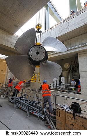 Stock Photo - "Construction site of the new hydropower plant in Rheinfelden, shaft 3, positioning the impeller, 6. 5 metres in diameter and weighing 40 tons, Rheinfelden - Ost, Rheinfelden - Baden, Baden-Wurttemberg, Germany, Europe". Fotosearch