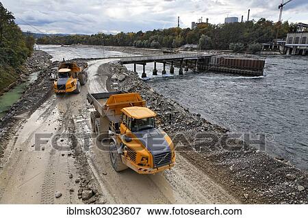 "Construction site of the new hydropower plant in Rheinfelden, deepening of the lower water with a temporary filled dam in the Rhine River, Rheinfelden - Ost, Rheinfelden - Baden, Baden-Wurttemberg, Germany, Europe" View Large Photo Image Stock Photo - "Construction site of the new hydropower plant in Rheinfelden, deepening of the lower water with a temporary filled dam in the Rhine River, Rheinfelden - Ost, Rheinfelden - Baden, Baden-Wurttemberg, Germany, Europe". Fotosearch