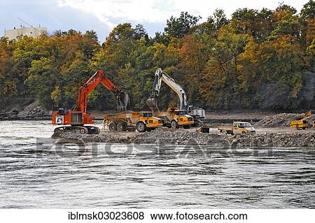 "Construction site of the new hydropower plant in Rheinfelden, deepening of the lower water with a temporary filled dam in the Rhine River, Rheinfelden - Ost, Rheinfelden - Baden, Baden-Wurttemberg, Germany, Europe" View Large Photo Image Stock Photo - "Construction site of the new hydropower plant in Rheinfelden, deepening of the lower water with a temporary filled dam in the Rhine River, Rheinfelden - Ost, Rheinfelden - Baden, Baden-Wurttemberg, Germany, Europe". Fotosearch