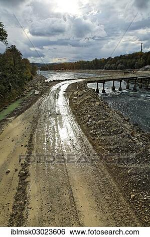 "Construction site of the new hydropower plant in Rheinfelden, deepening of the lower water with a temporary filled dam in the Rhine River, Rheinfelden - Ost, Rheinfelden - Baden, Baden-Wurttemberg, Germany, Europe" View Large Photo Image Stock Photograph - "Construction site of the new hydropower plant in Rheinfelden, deepening of the lower water with a temporary filled dam in the Rhine River, Rheinfelden - Ost, Rheinfelden - Baden, Baden-Wurttemberg, Germany, Europe". Fotosearch