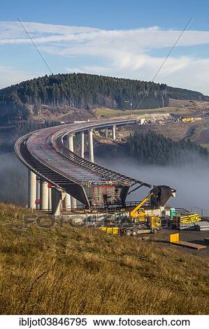 "Construction site of the Talbrucke Nuttlar viaduct, A46 highway bridge, 660 meters long, near Nuttlar, North Rhine-Westphalia, Germany, Europe" View Large Photo Image Stock Photography - "Construction site of the Talbrucke Nuttlar viaduct, A46 highway bridge, 660 meters long, near Nuttlar, North Rhine-Westphalia, Germany, Europe". Fotosearch