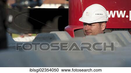 "Construction worker at a building site in Fridolfing, Bavaria, Germany, Europe" View Large Photo Image Stock Image - "Construction worker at a building site in Fridolfing, Bavaria, Germany, Europe". Fotosearch