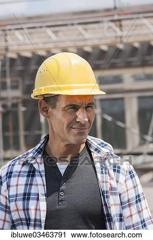 "Construction worker on a construction site, portrait, Mannheim, Baden-Wurttemberg, Germany, Europe" View Large Photo Image Stock Image - "Construction worker on a construction site, portrait, Mannheim, Baden-Wurttemberg, Germany, Europe". Fotosearch