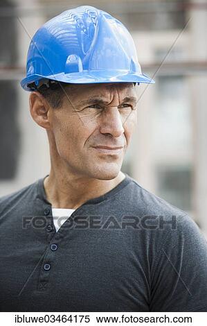 Stock Photography - "Construction worker on a construction site, portrait, Mannheim, Baden-Wurttemberg, Germany, Europe". Fotosearch