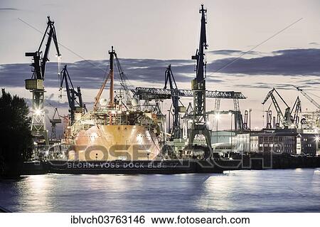 "Container ship in a dry dock in the port, Hamburg, Hamburg, Germany, Europe" View Large Photo Image Stock Photograph - "Container ship in a dry dock in the port, Hamburg, Hamburg, Germany, Europe". Fotosearch