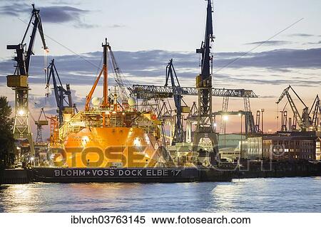 "Container ship in a dry dock in the port, Hamburg, Hamburg, Germany, Europe" View Large Photo Image Stock Photography - "Container ship in a dry dock in the port, Hamburg, Hamburg, Germany, Europe". Fotosearch