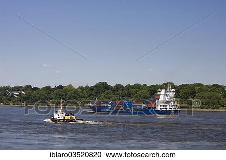Stock Image - "Container ship on the Elbe river, Blankenese, Hamburg, Hamburg, Germany, Europe". Fotosearch