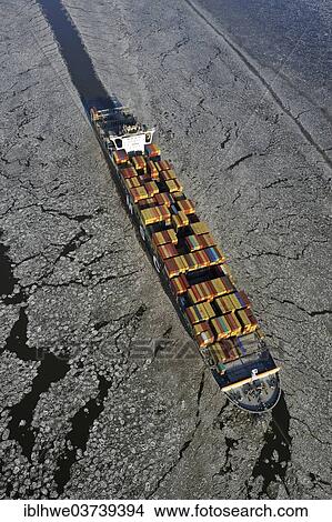 "Container ship on the Elbe River with ice flow, aerial view, Hamburg, Hamburg, Germany, Europe" View Large Photo Image Picture - "Container ship on the Elbe River with ice flow, aerial view, Hamburg, Hamburg, Germany, Europe". Fotosearch