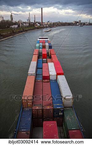 "Container ship on the Rhine travelling upstream at Duisburg-Homberg, Homberg, Duisburg, North Rhine-Westphalia, Germany, Europe" View Large Photo Image Picture - "Container ship on the Rhine travelling upstream at Duisburg-Homberg, Homberg, Duisburg, North Rhine-Westphalia, Germany, Europe". Fotosearch