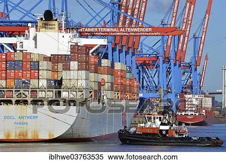 "Container ship OOCL Antwerp of the OOLC shipping company with the tug Bugsier 10, Container Terminal Werder, Hamburg, Hamburg, Germany, Europe" View Large Photo Image Stock Photography - "Container ship OOCL Antwerp of the OOLC shipping company with the tug Bugsier 10, Container Terminal Werder, Hamburg, Hamburg, Germany, Europe". Fotosearch