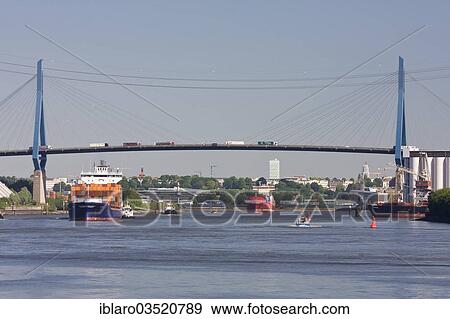 "Container ship passing under Koehlbrand Bridge, Altenwerder, Hamburg, Hamburg, Germany, Europe" View Large Photo Image Stock Photo - "Container ship passing under Koehlbrand Bridge, Altenwerder, Hamburg, Hamburg, Germany, Europe". Fotosearch