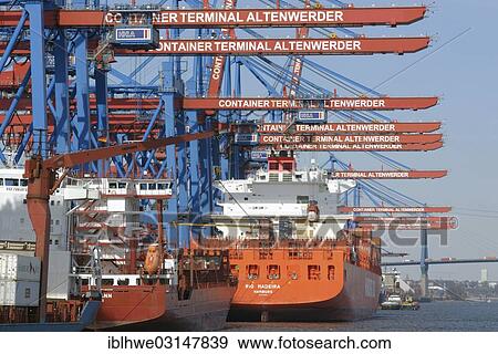 "Container ships and feeder vessels at HHLA Container Terminal Altenwerder, CTA, Hamburg, Hamburg, Hamburg, Germany, Europe" View Large Photo Image Stock Photo - "Container ships and feeder vessels at HHLA Container Terminal Altenwerder, CTA, Hamburg, Hamburg, Hamburg, Germany, Europe". Fotosearch