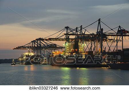 "Container ships in the port during unloading, dusk, Waltershof, Hamburg, Hamburg, Germany, Europe" View Large Photo Image Stock Photograph - "Container ships in the port during unloading, dusk, Waltershof, Hamburg, Hamburg, Germany, Europe". Fotosearch