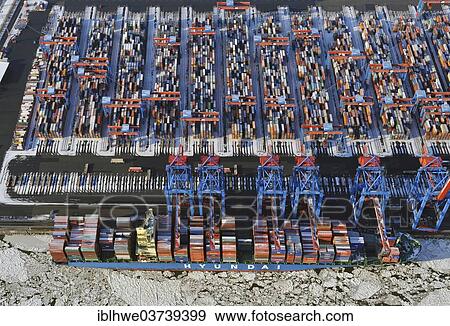 "Container Terminal Altenwerder, container ship being loaded and unload, in winter, aerial view, Hamburg, Hamburg, Germany, Europe" View Large Photo Image Stock Photo - "Container Terminal Altenwerder, container ship being loaded and unload, in winter, aerial view, Hamburg, Hamburg, Germany, Europe". Fotosearch