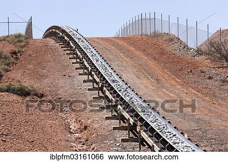 "Conveyer band transporting rocks at a goldfield, Kalgoorlie, Western Australia, Australia, Oceania" View Large Photo Image Stock Photograph - "Conveyer band transporting rocks at a goldfield, Kalgoorlie, Western Australia, Australia, Oceania". Fotosearch