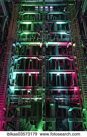 "Conveyor lifts of mine shaft No. 7, illuminated during ExtraSchicht, a night of industrial culture, disused coal mine of Zeche Ewald Colliery, Herten, Ruhr district, North Rhine-Westphalia, Germany, Europe" View Large Photo Image Stock Photo - "Conveyor lifts of mine shaft No. 7, illuminated during ExtraSchicht, a night of industrial culture, disused coal mine of Zeche Ewald Colliery, Herten, Ruhr district, North Rhine-Westphalia, Germany, Europe". Fotosearch