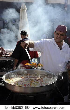"Cook boils vegetables in a large pan at the annual All Saints Market in Cocentaina, Alicante province, Spain, Europe" View Large Photo Image Picture - "Cook boils vegetables in a large pan at the annual All Saints Market in Cocentaina, Alicante province, Spain, Europe". Fotosearch