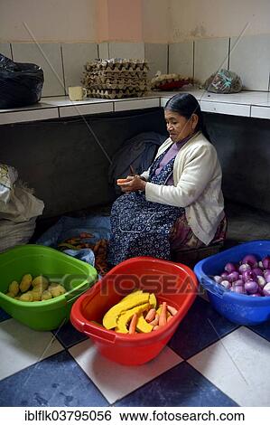 "Cook working in the kitchen of a boarding school, Carmen Pampa, Yungas, Department of La Paz, Bolivia, South America" View Large Photo Image Stock Photograph - "Cook working in the kitchen of a boarding school, Carmen Pampa, Yungas, Department of La Paz, Bolivia, South America". Fotosearch