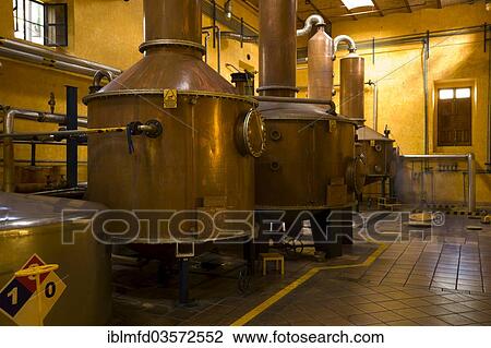 Stock Image - "Copper tanks for the tequila distillation, Jose Cuervo Tequila Distillery, Tequila, Jalisco, Mexico, North America". Fotosearch
