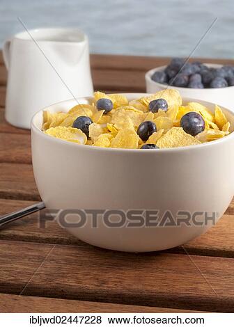 Stock Photo - Cornflakes with blueberries. Fotosearch