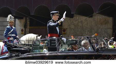 "Coronation, King Felipe VI. of Spain riding in an open-top Rolls Royce on Gran Via en route from Parliament to the Royal Palace, Madrid, Spain, Europe" View Large Photo Image Stock Photo - "Coronation, King Felipe VI. of Spain riding in an open-top Rolls Royce on Gran Via en route from Parliament to the Royal Palace, Madrid, Spain, Europe". Fotosearch