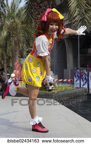 "Cosplay, Harajuku, girl dressed as a Japanese manga character clown in front of the Siam Paragon shopping centre, Bangkok, Thailand, Asia" View Large Photo Image Stock Image - "Cosplay, Harajuku, girl dressed as a Japanese manga character clown in front of the Siam Paragon shopping centre, Bangkok, Thailand, Asia". Fotosearch