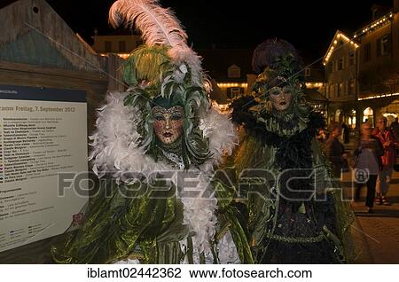Stock Image - "Costume wearers, Venetian Fair, on the historic Marktplatz market square, Ludwigsburg, Baden-Wuerttemberg, Germany, Europe". Fotosearch