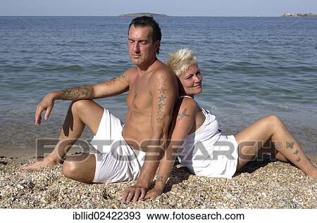Couple, 41, 50 years, on the beach, beach holiday View Large Photo Image Stock Image - Couple, 41, 50 years, on the beach, beach holiday. Fotosearch