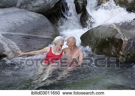 "Couple, 59 and 68 years, bathing in the mountain river of Torrente Codera, Valle dei Ratti, Val dei Ratti, Lombardy, Italy, Europe" View Large Photo Image Stock Image - "Couple, 59 and 68 years, bathing in the mountain river of Torrente Codera, Valle dei Ratti, Val dei Ratti, Lombardy, Italy, Europe". Fotosearch